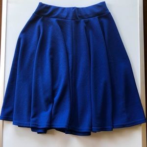 Mid length, blue “Urban CoCo” Skirt.